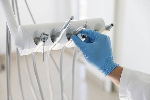 Professional Tooth Extraction technician working in Charles City County County, VA